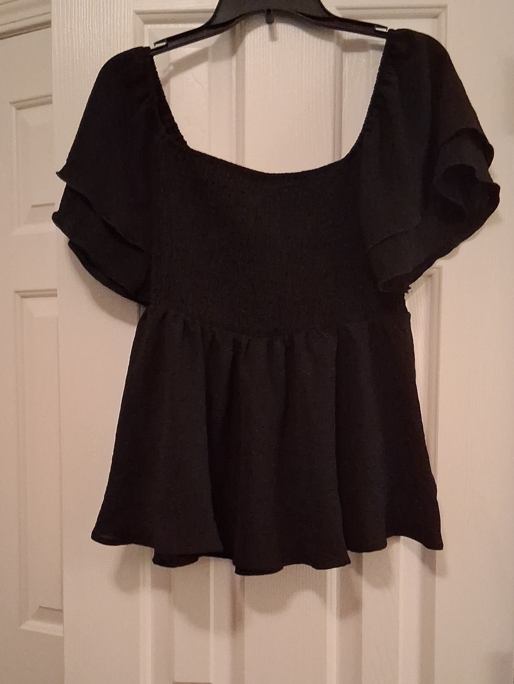 Black Smocked Peplum Blouse with Flutter Sleeves
